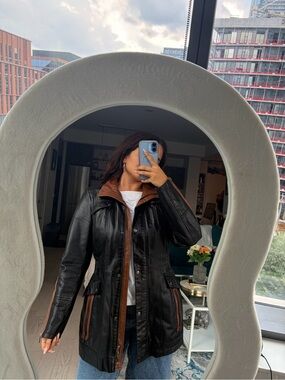 Danier Black Leather Jacket with Brown Trim
